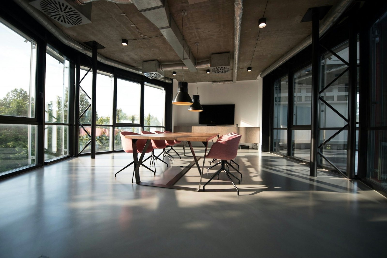 Light-filled design studio with considered furniture and architecture